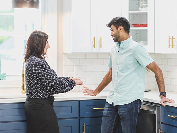 A man viewing a home with the intent to buy